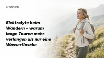 Wanderin auf einem Bergpfad am Morgen – Elektrolyte beim Wandern